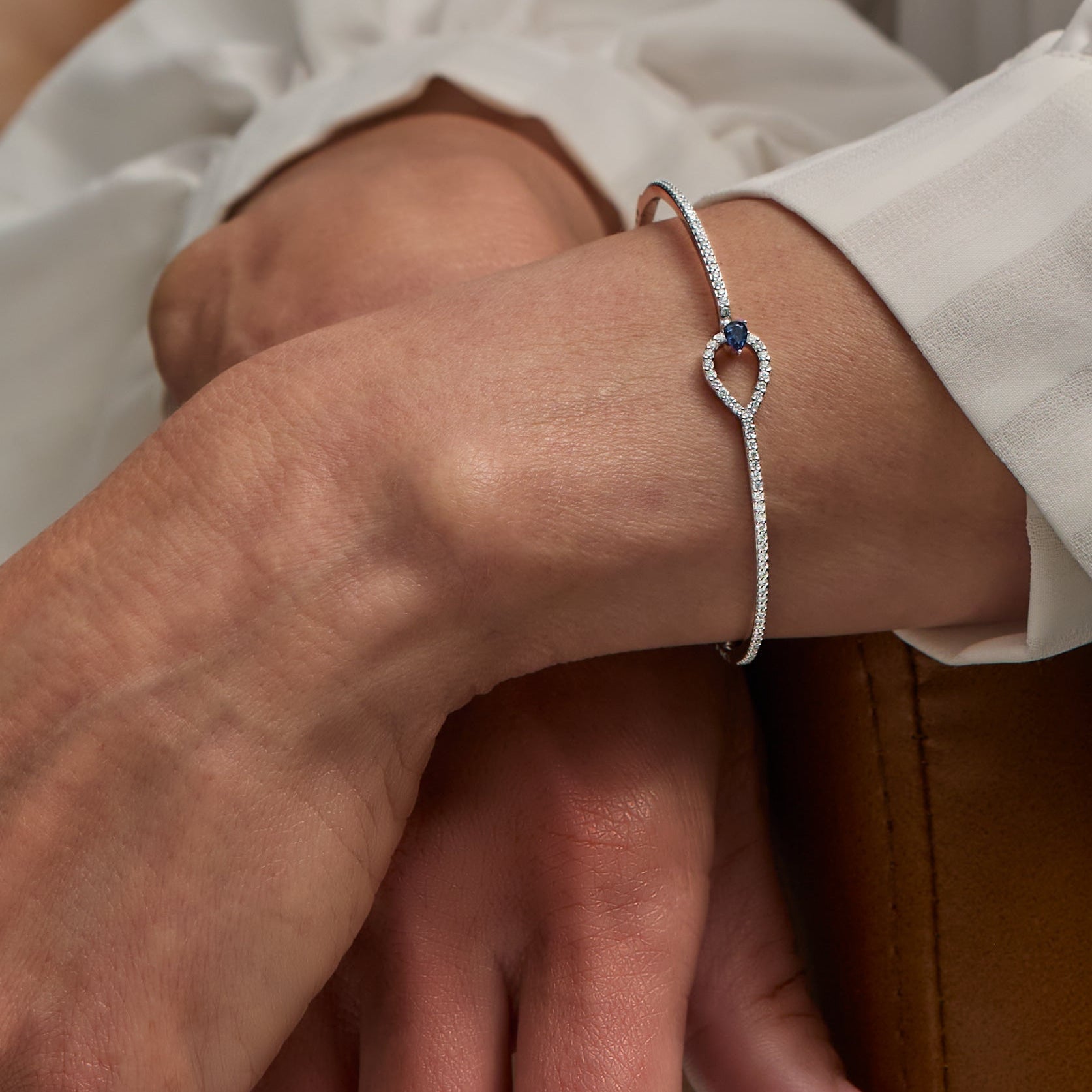 White Gold Diamond and Blue Sapphire Bangle - On Wrist