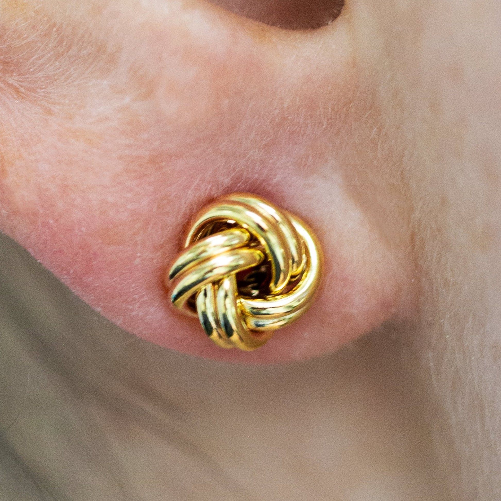 Yellow Gold Love Knot Earrings - On the ear