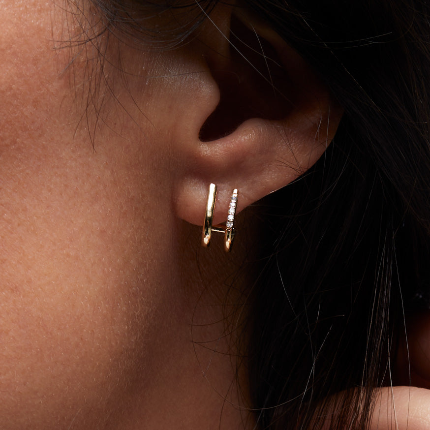 Yellow Gold Diamond Double Curve Hoop Earrings - Close up on Ear