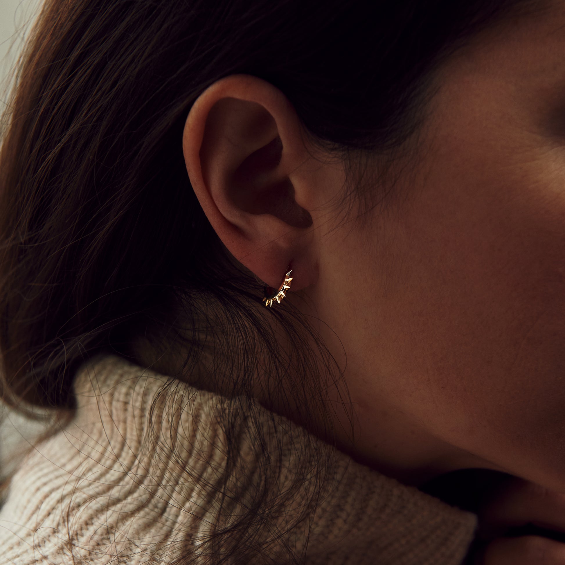 Yellow Gold Spike Huggie Earrings - Another ear view