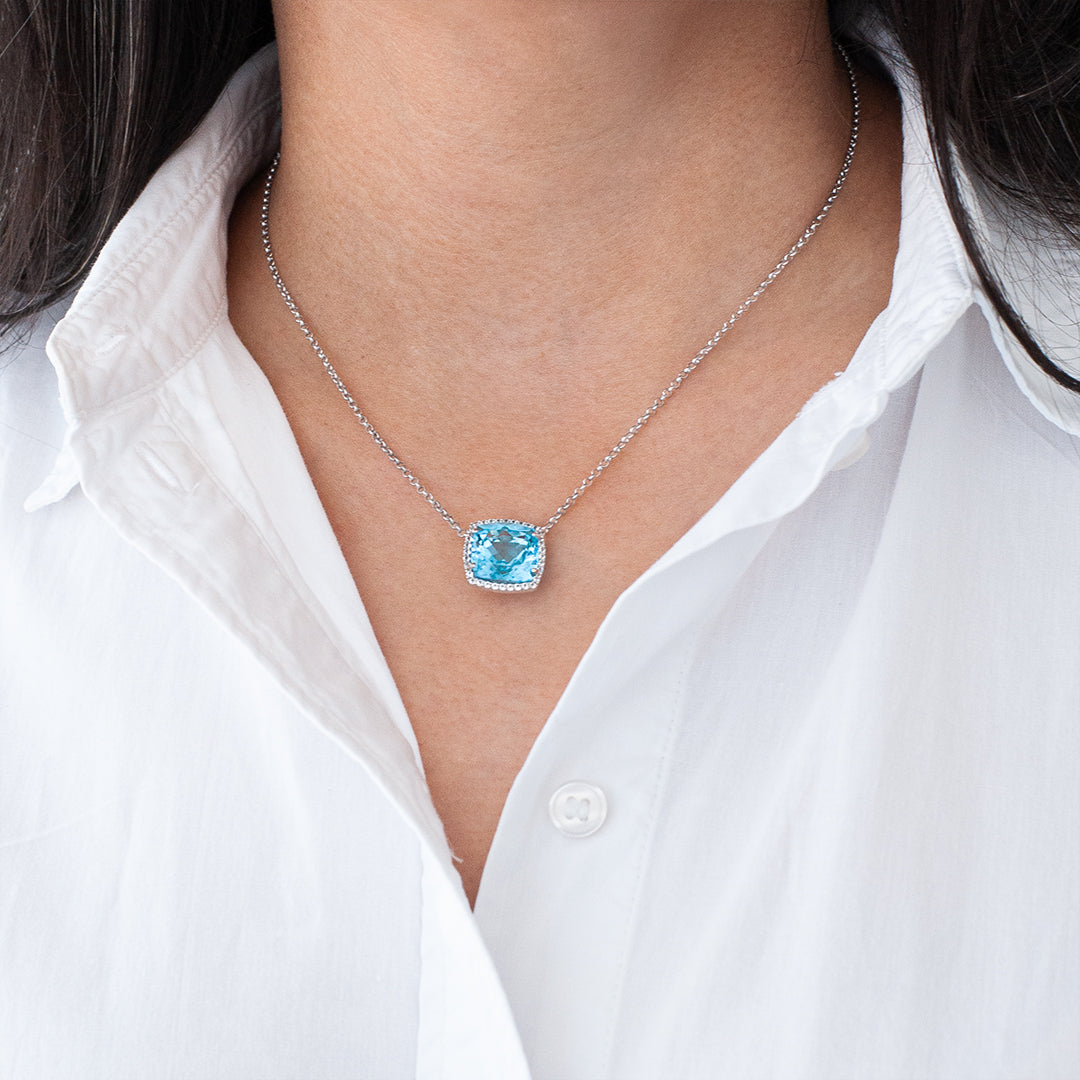 Sterling Silver Cushion Cut Blue Topaz Pendant - On Neck