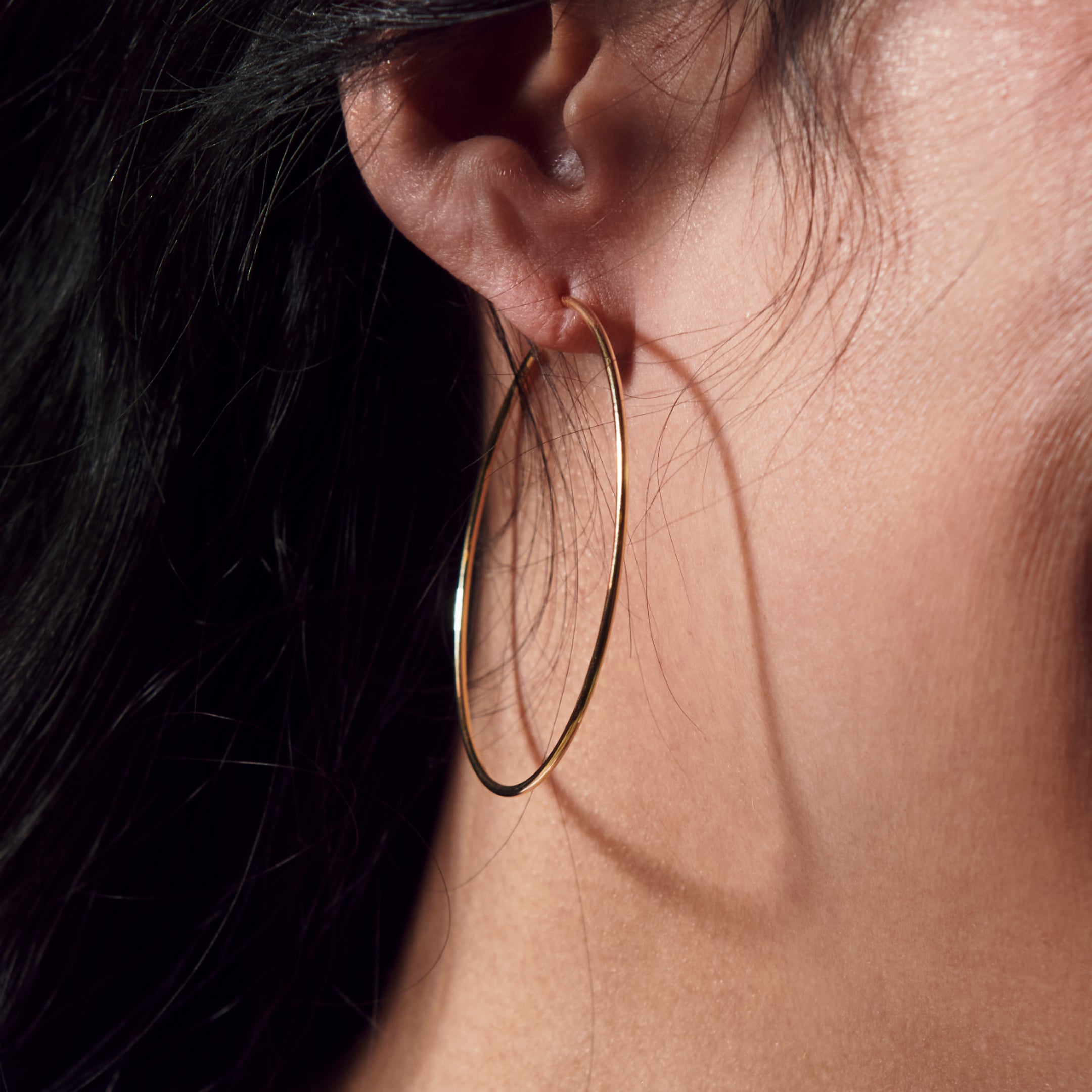 Yellow Gold Hoop Earrings - 40mm - Close Up on Ear